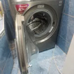 Pralka LG SteamSpa F2J6WY8S po udanej wymianie złamanego zatrzasku drzwi